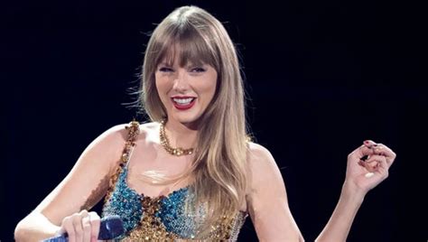 Taylor Swift postpones Rio de Janeiro show, citing record heat a day after fan dies during concert